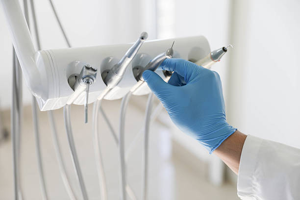Professional Invisalign Clear Aligners technician working in East Village, CT